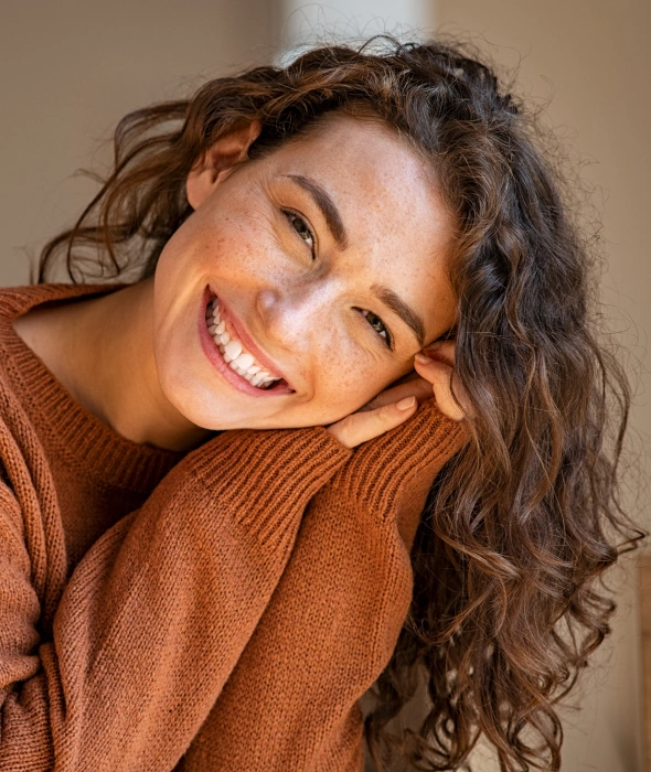Smiling patient benefiting from flexible dental appointment scheduling
