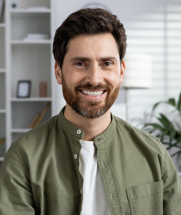 Patient smiling after restorative dental treatment