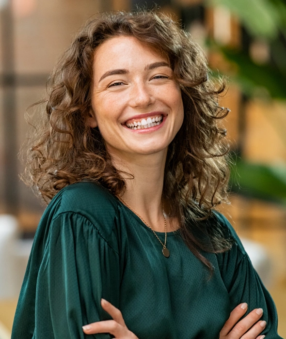 Patient showing a brighter smile after professional teeth whitening