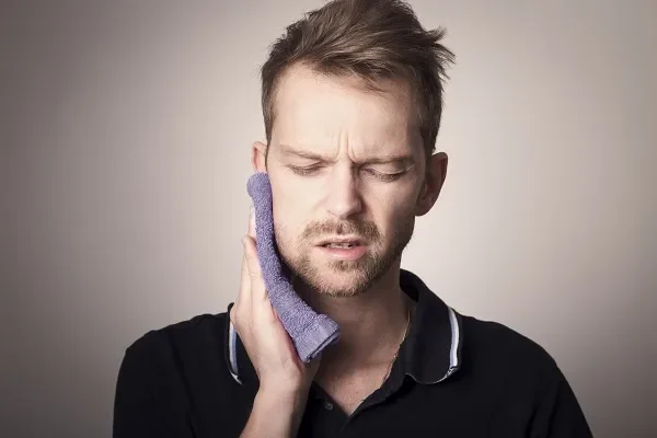 patient with severe tooth pain