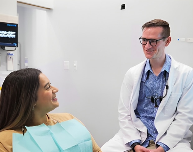 Dentist with a happy patient