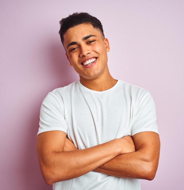 Gentleman smiling brightly after receiving teeth whitening treatment at Westinghouse Dental in Georgetown, TX