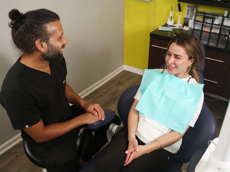 Dentist in Chicago with a happy patient