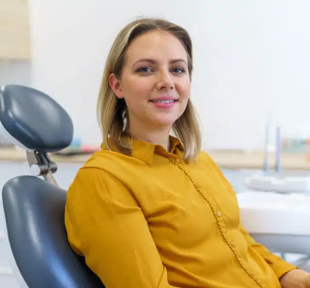 Woman patient seated in a dental treatment room at Willow Street Dental in Chippewa Falls, WI