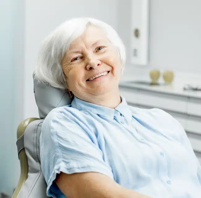 Senior woman receiving root canal treatment at Willow Street Dental in Chippewa Falls, WI