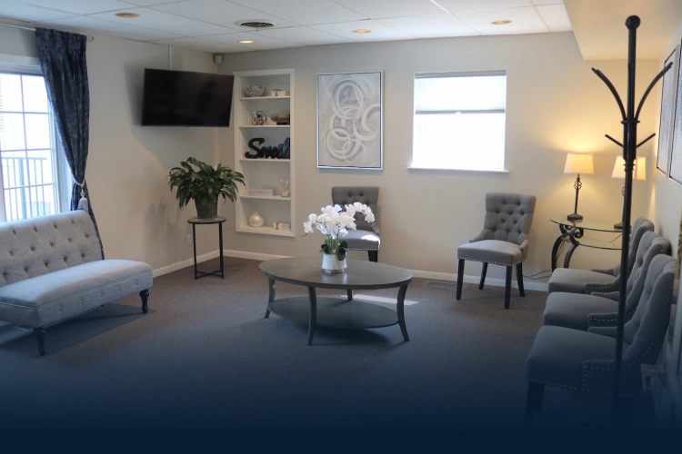 Welcoming dental practice reception area with comfortable seating and modern decor in Aurora.